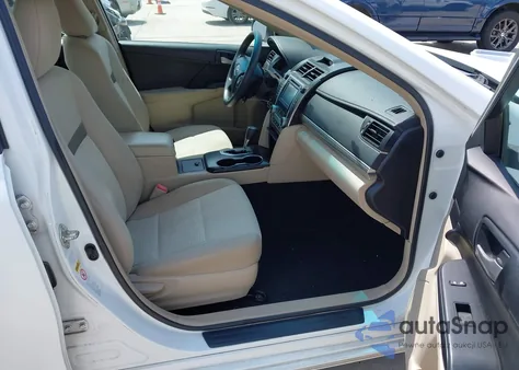 2014 Toyota Camry Le z USA, uszkodzony, nr VIN 4T1BF1FKXEU781661